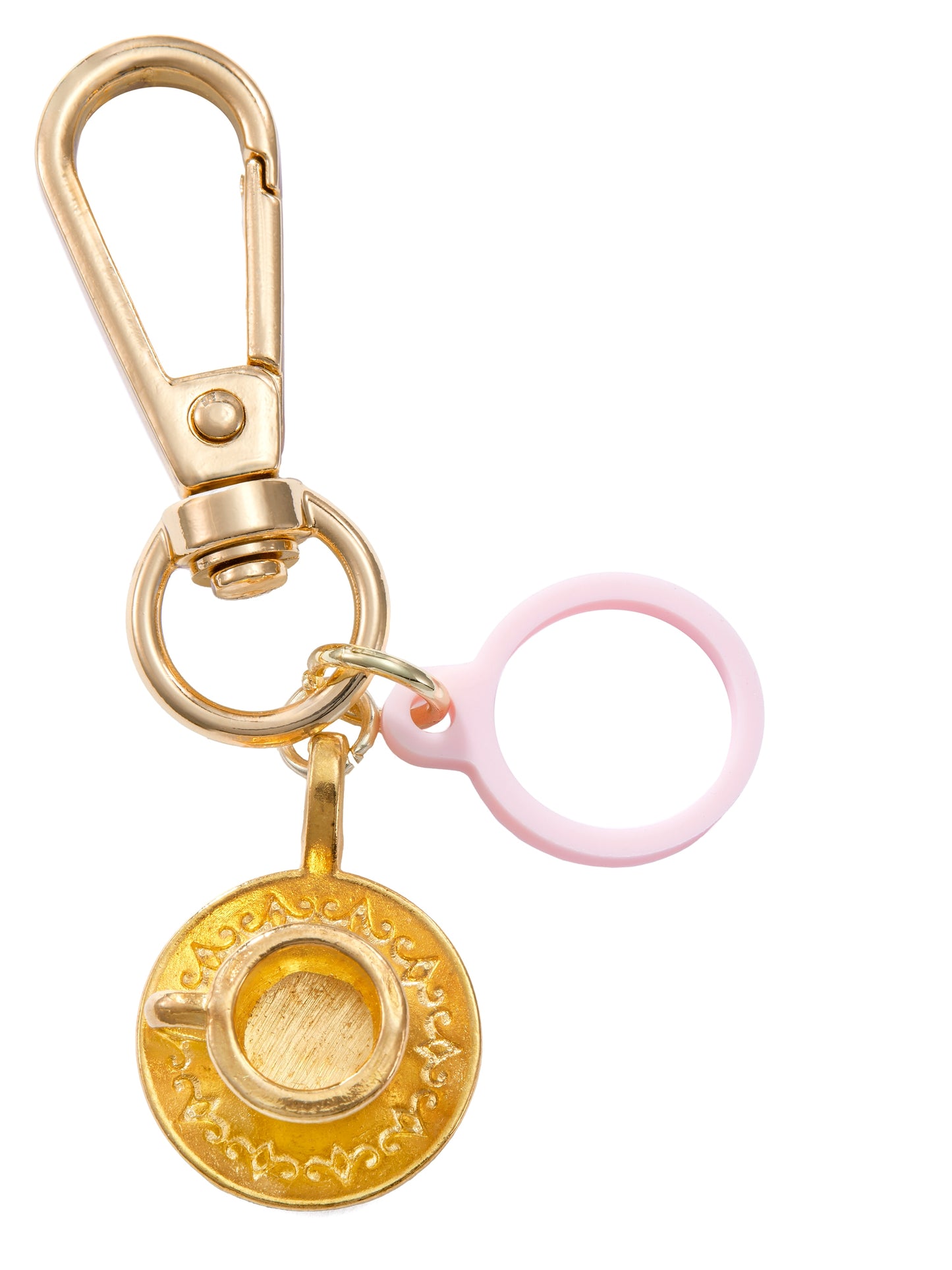Gold keychain with a pink ring and decorative charm on a white background