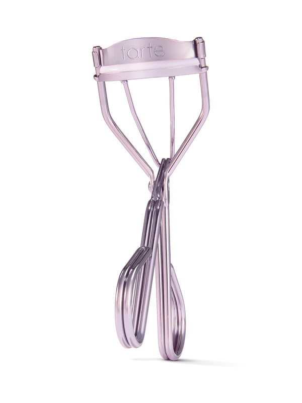 Lash curler with 'tarte' branding on a white background