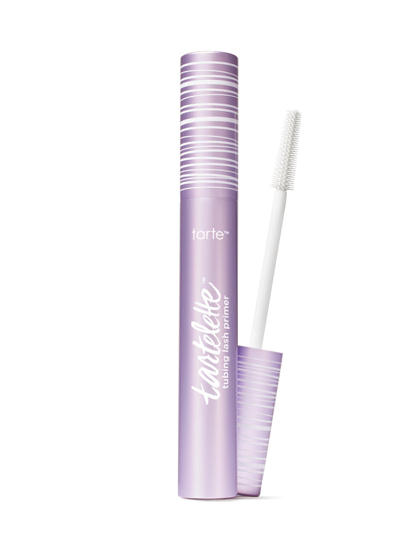A tube of tartelette tubing lash primer with the wand applicator showing the clear product.