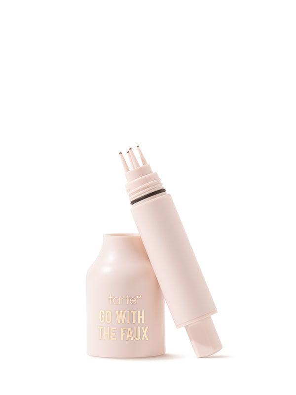 Light-pink Tarte eyebrow pencil lies uncapped on a white background; cap set beside, exposing an angled tip and slim barrel. Text on product: tarte