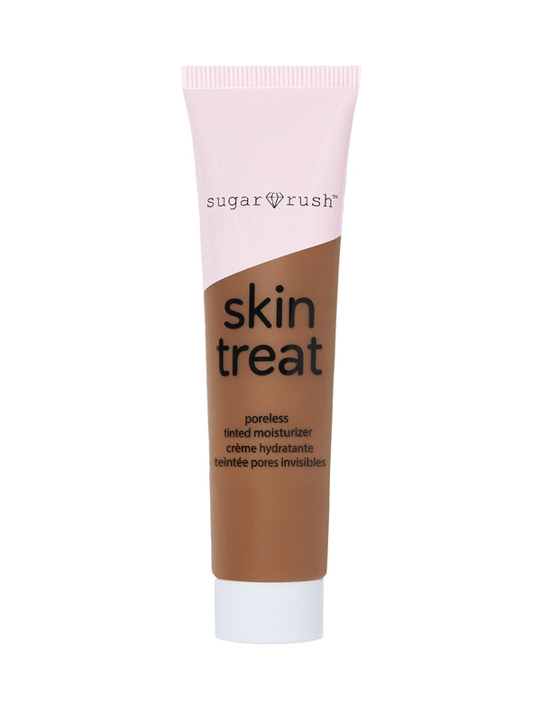 Tube of skin treat poreless tinted moisturizer by Sugar Rush with a pink and white color scheme.