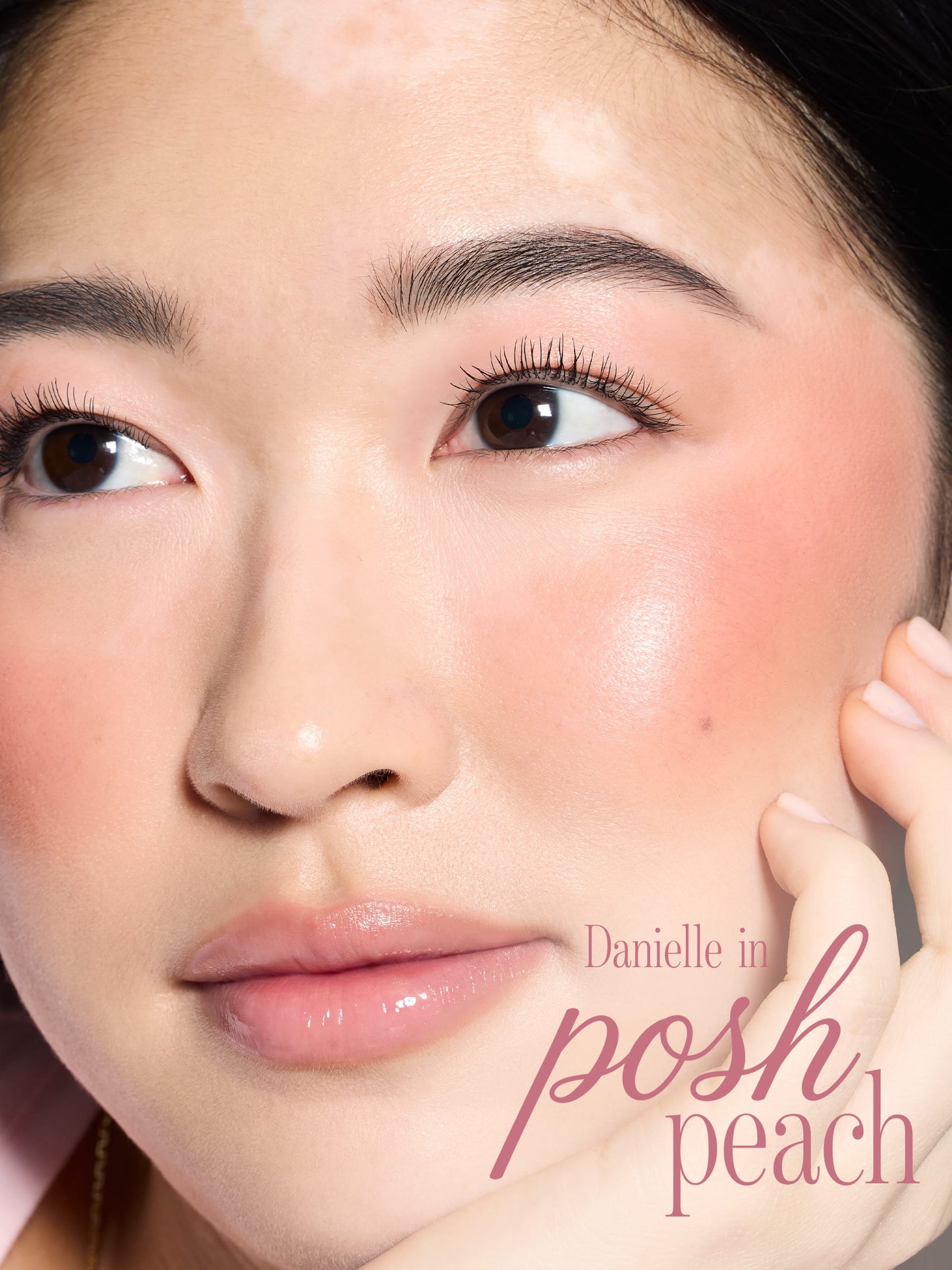 woman wearing tarte cosmetics XOXO blush and go macaron trio blush in shade posh peach
