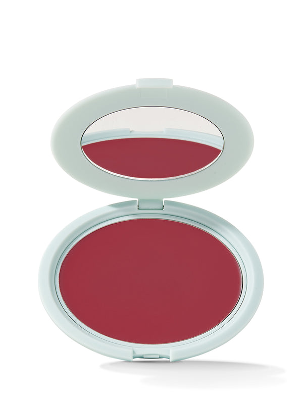 Compact blush in a white case on a white background