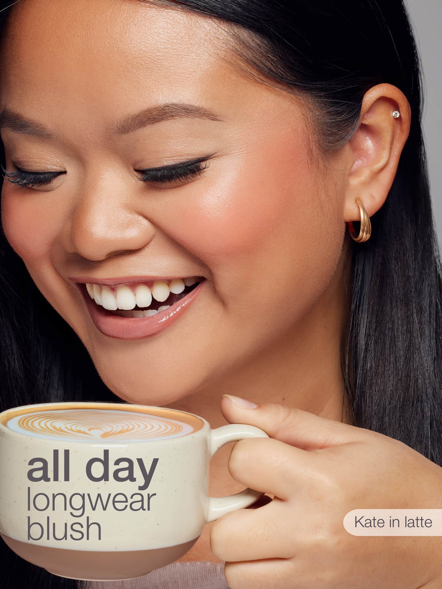 Woman holding a cup with 'all day longwear blush' text and 'Kate in latte' branding.