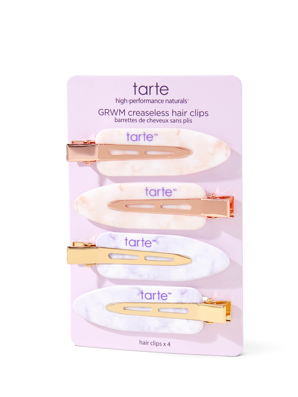 Four Tarte Cosmetics creaseless hair clips in marbled designs are displayed on a lavender card. The card features text: tarte high-performance naturals™ GRWM creaseless hair clips barrettes de cheveux sans plis, hair clips x 4.