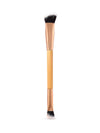 Makeup brush with black bristles on a white background
