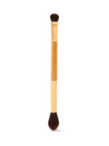 Makeup brush with wooden handle and black bristles on a white background
