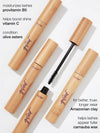 Tarte mascara with wooden applicators on a white background