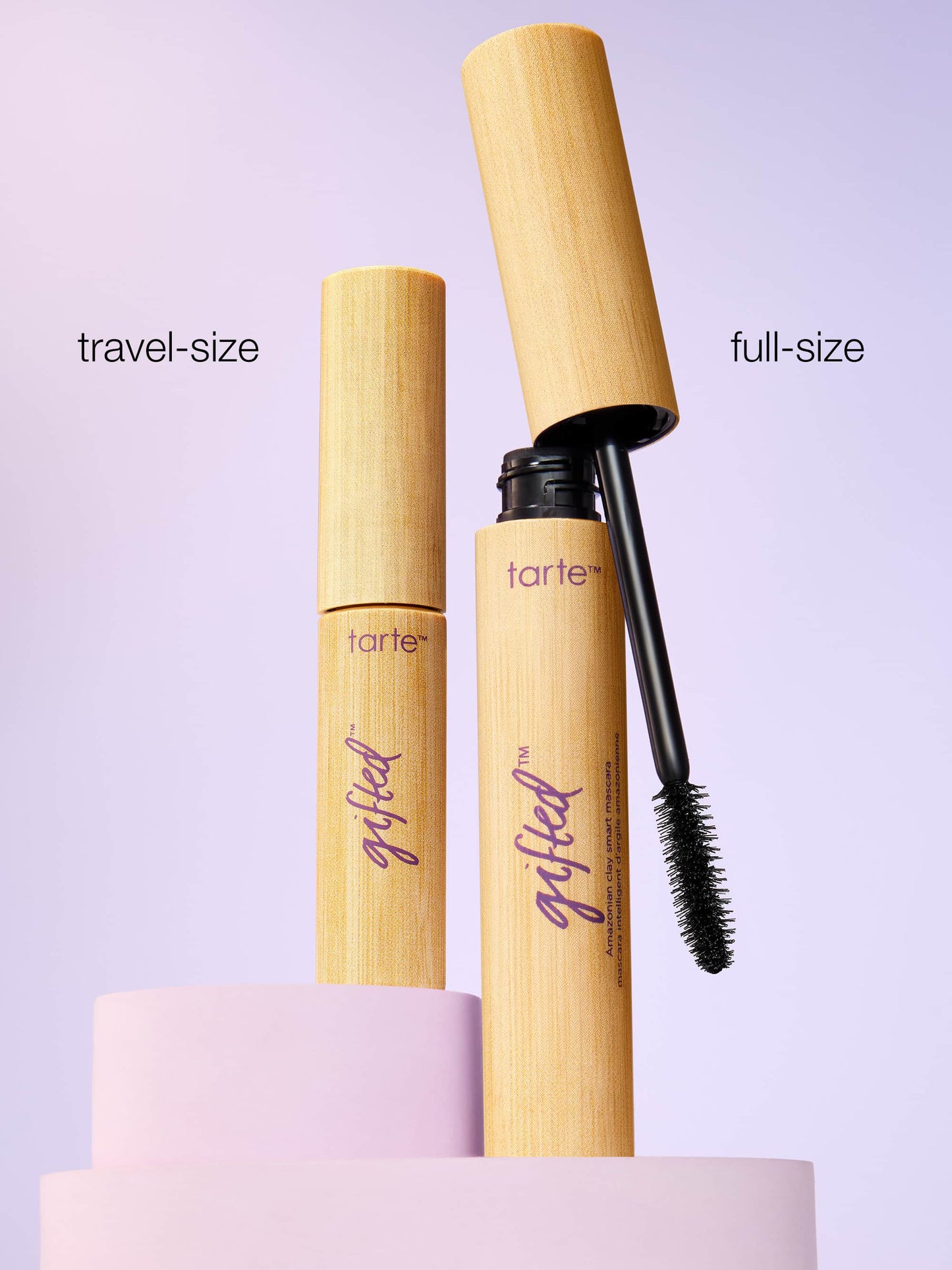Tarte mascara with travel-size and full-size options on a light purple background