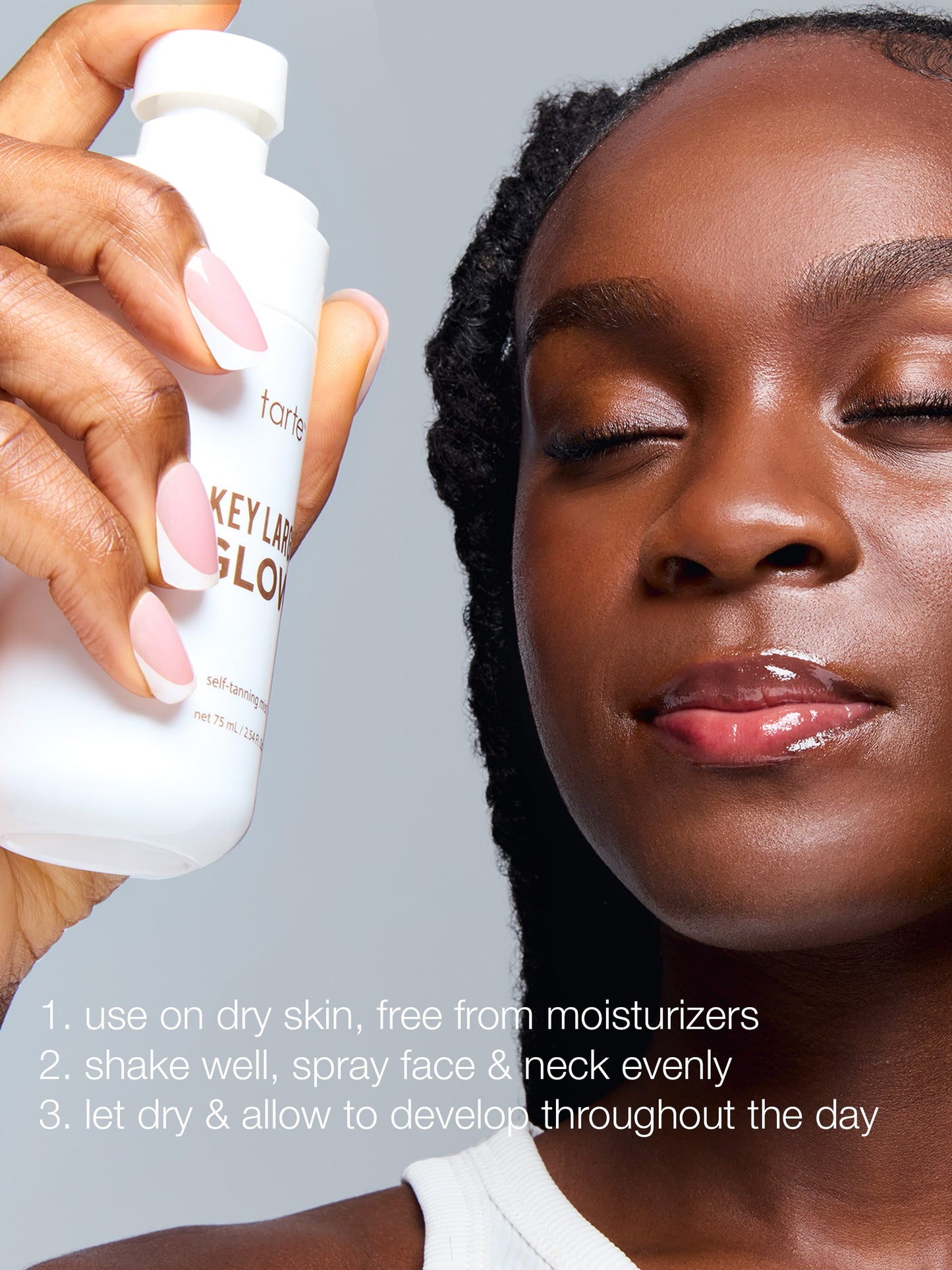 Person holding a skincare product with text on a gray background