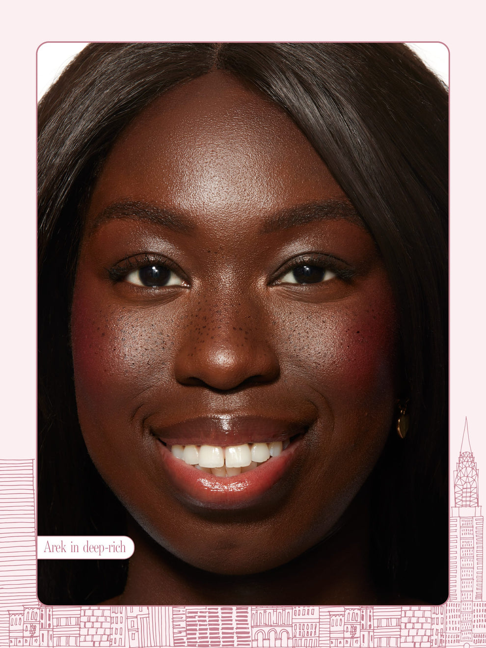 woman using Tarte limited-edition go with the faux freckle stamp shade deep rich