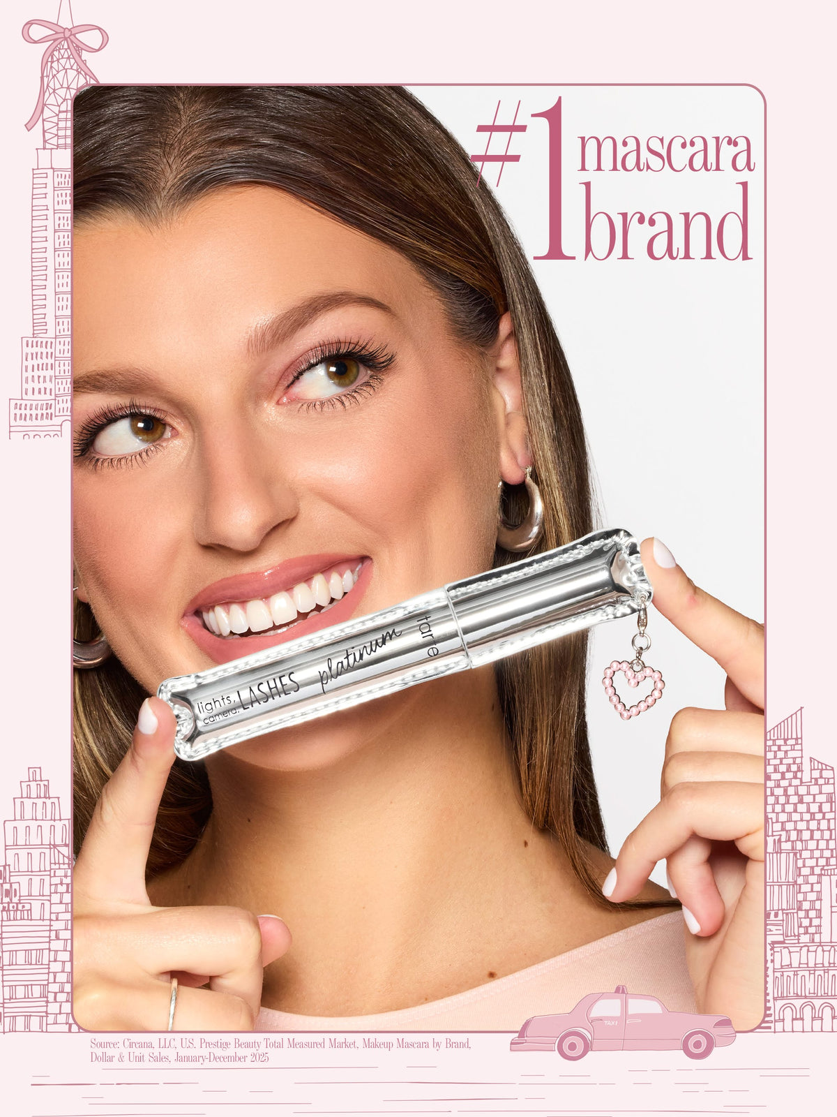 woman holding tarte cosmetics lights camera lashes mascara and free heart charm