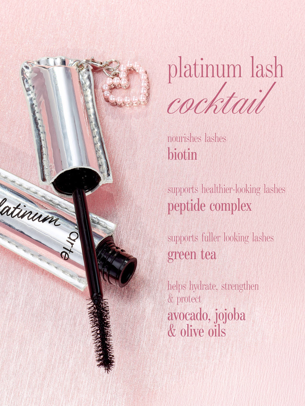 tarte cosmetics lights camera lashes mascara and free heart charm. nourishes, hydrates, strengthens, and protects lashes 
