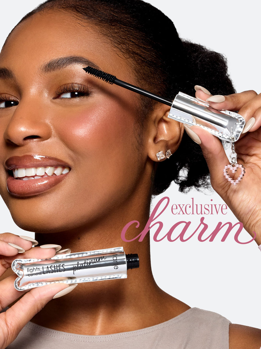 tarte cosmetics lights camera lashes mascara and free exclusive heart charm