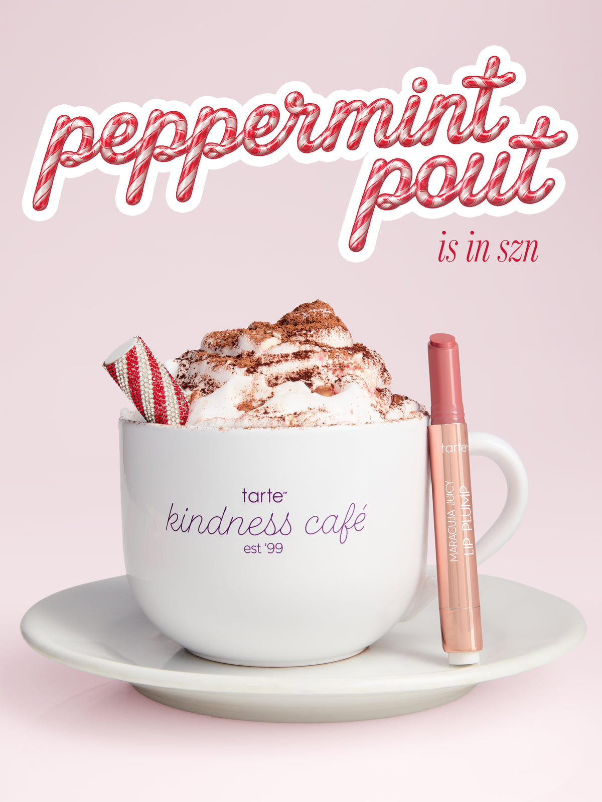 A ceramic mug filled with whipped cream and cocoa, with tect that sayd 'tarte kindness cafe' next to maracuja juicy lip plump. Large text at the top reads 'peppermint pout is in szn' on a pale pink background.