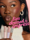 woman holding tarte cosmetics maracuja juicy lip trio with text ' lips dressed to impress'