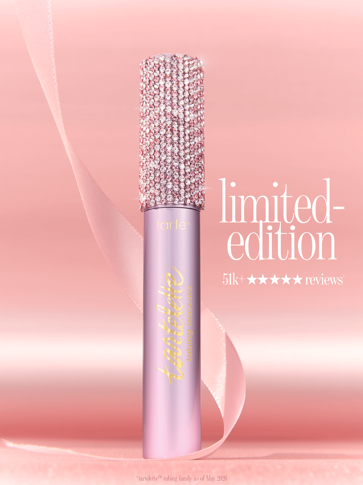 tarte cosmetics tartelette XL tubing mascara with limited edition cap on a pink background