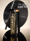 Tarte makeup products including a mascara and a foundation stick on a beige background.