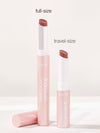 Two lip crèmes, one full-size and one travel-size, on a white background with 'tarte' branding.