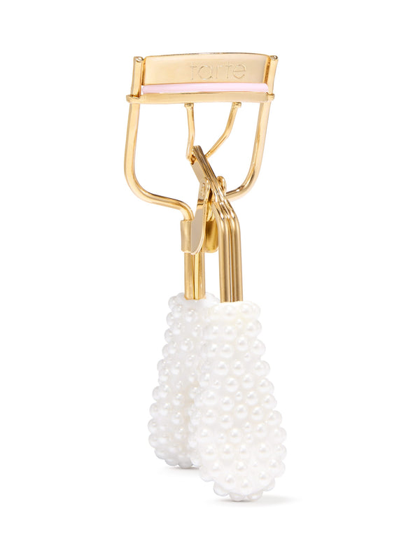 tarte cosmetics pearl lash curler agianst a white background