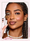 tarte cosmetics pearl lash curler, woman using against her eyelashes