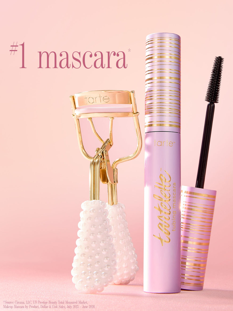 tarte cosmetics pearl lash curler and tartelette tubing mascara against a pink background with text '#1 mascara'