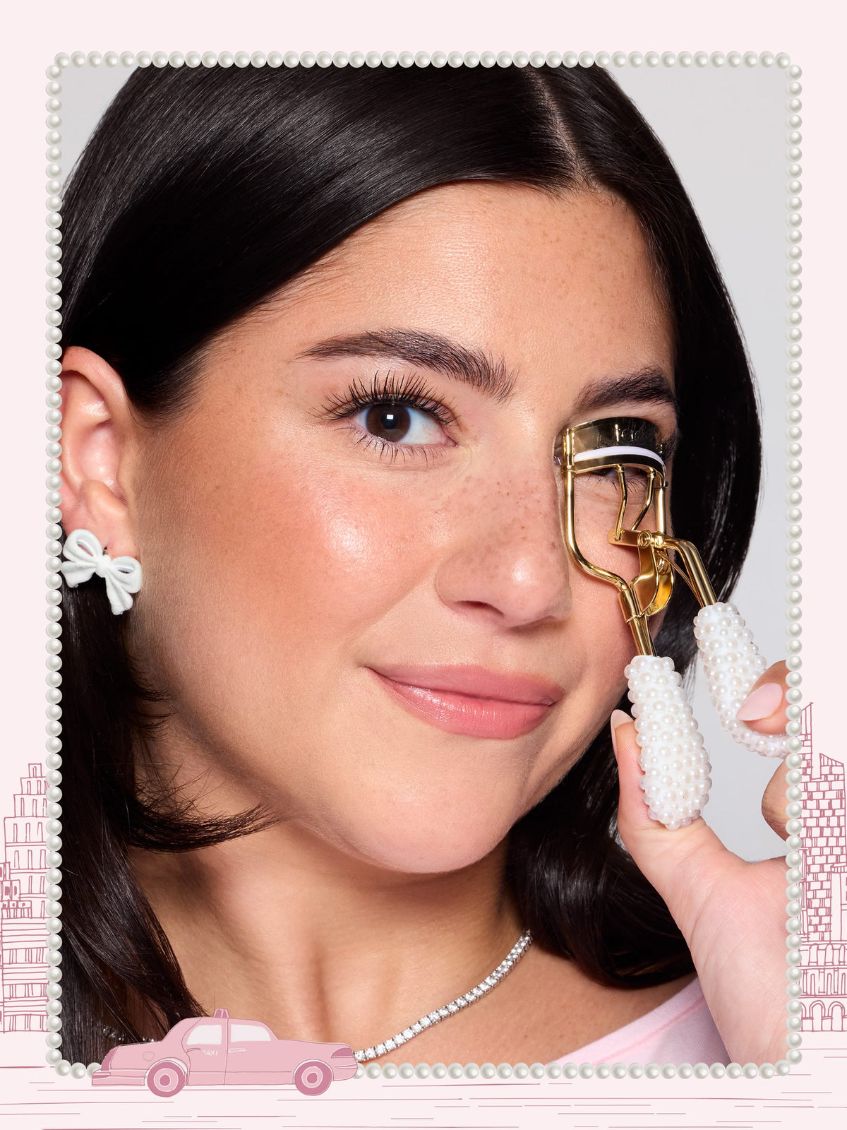 woman using the tarte cosmetics pearl lash curler on her eyelashes
