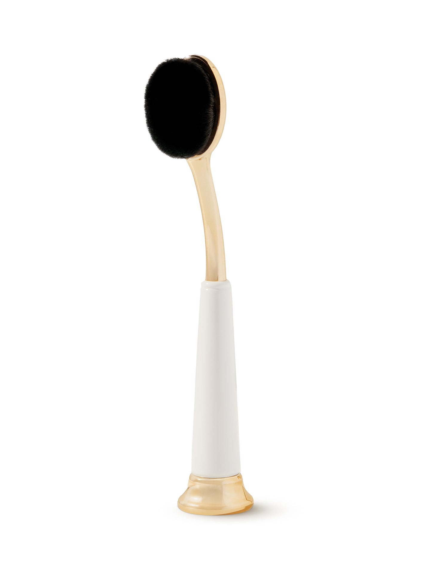 Makeup brush with black bristle head and gold and white handle on a white background