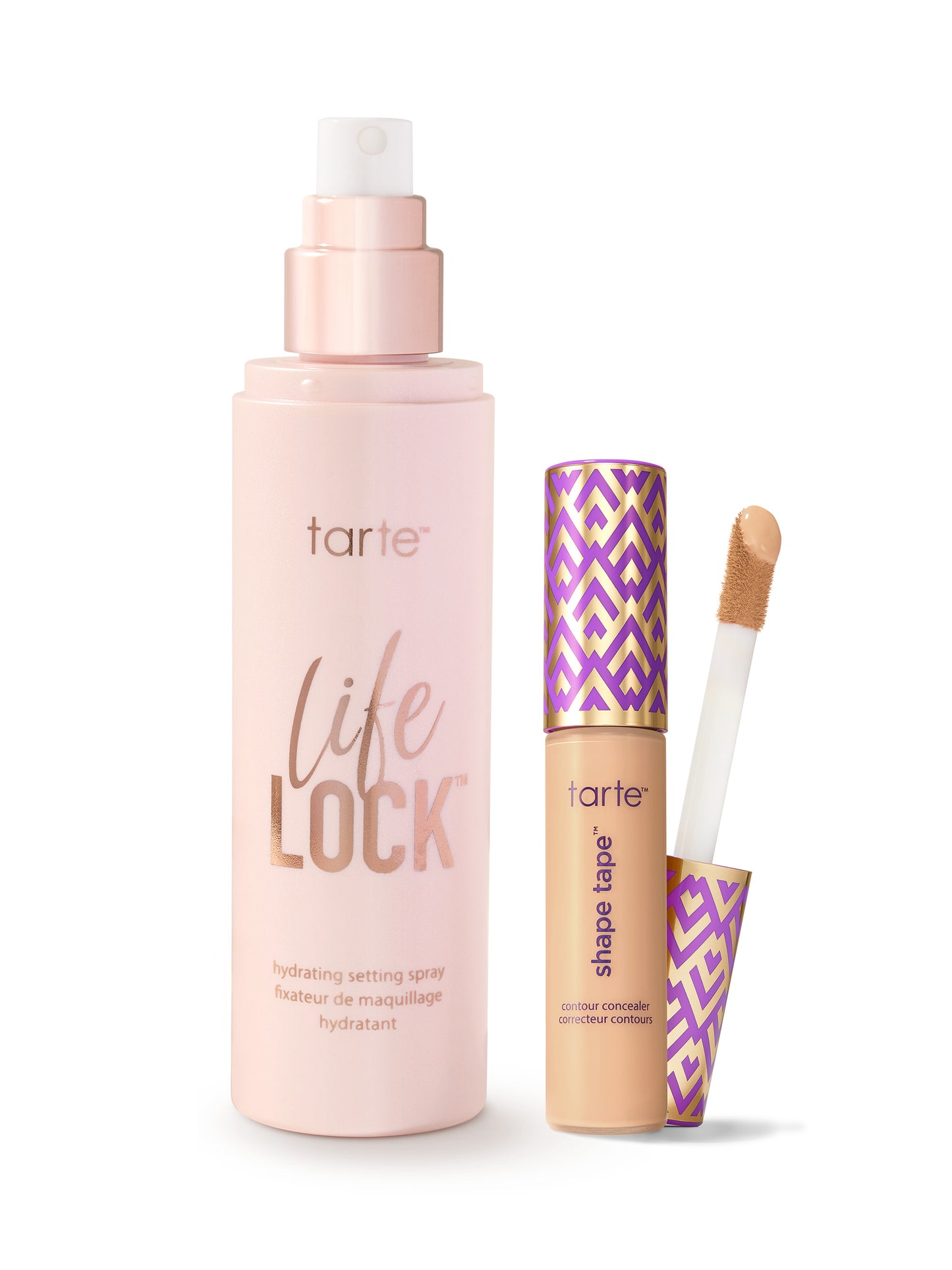 Tarte makeup products including a setting spray and shape tape on a white background