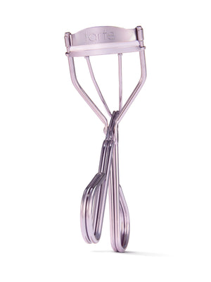 Lash curler with 'tarte' branding on a white background