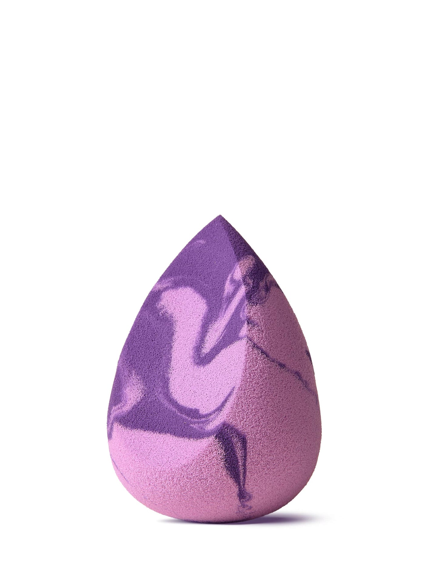 A teardrop-shaped, purple and pink marbled makeup sponge stands upright against a plain white background.