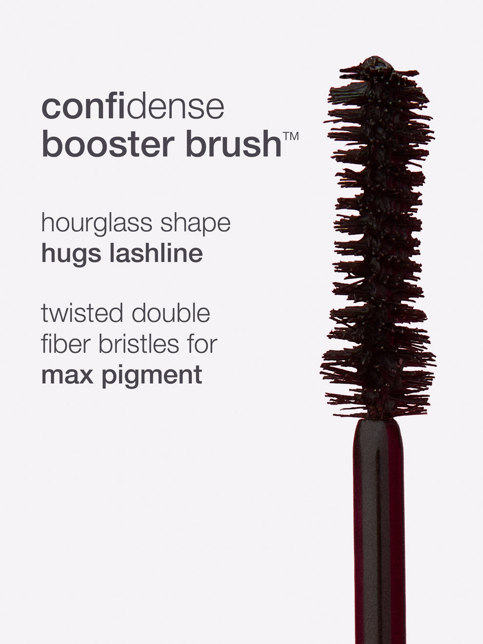 Mascara wand features twisted double fiber bristles for maximum pigment. Accompanying text highlights confidence booster brush, hourglass shape hugs lashline, and details for optimal makeup application. Background is plain.