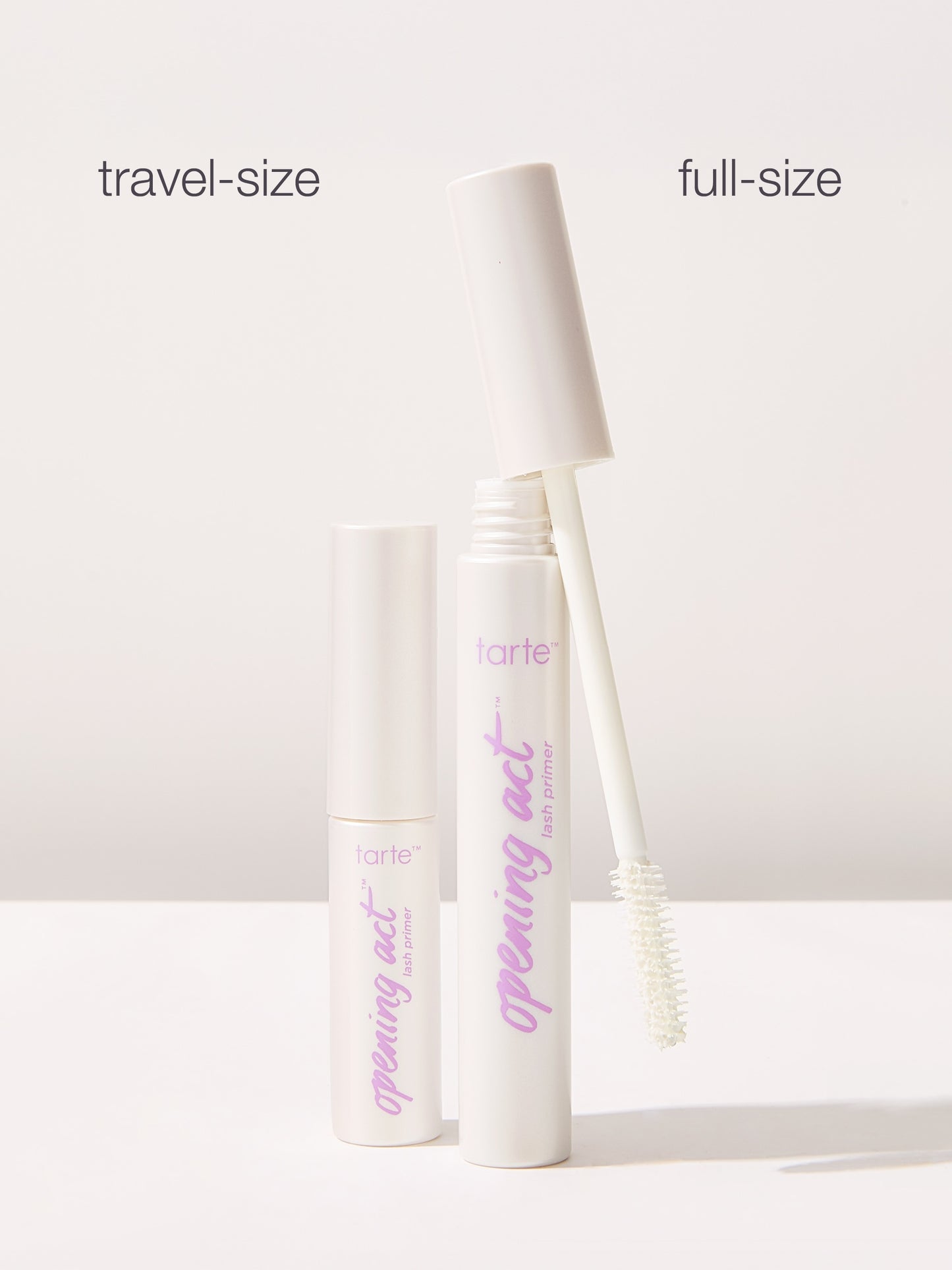 Tarte opening act mascara in travel-size and full-size on a white background