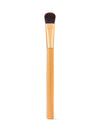 Makeup brush with wooden handle on a white background
