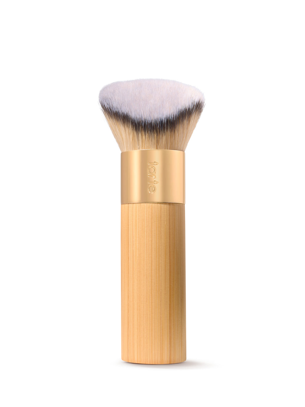 Makeup brush with wooden handle and white bristles on a white background