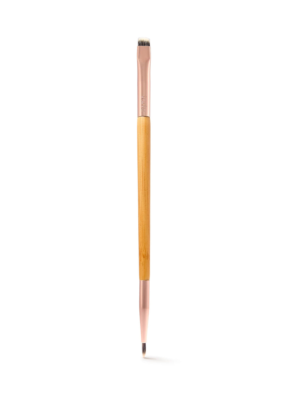 Makeup brush with wooden handle and metal ferrule on a white background