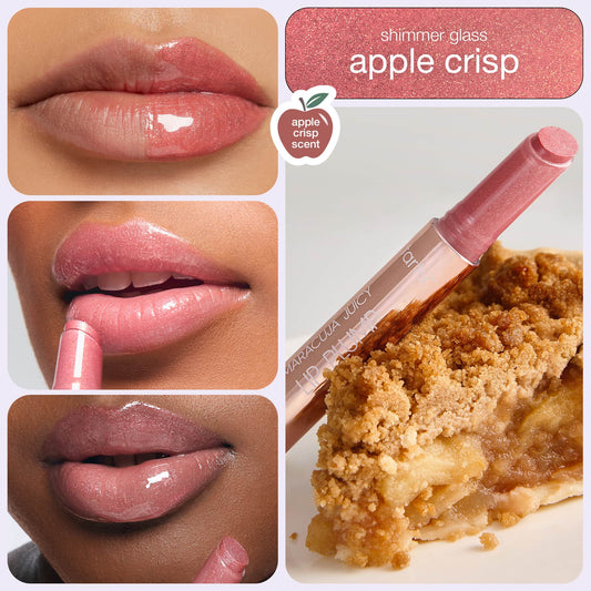Lips shine with glossy pink shimmer. A hand applies Tarte Cosmetics' Maracuja Juicy lip product beside a slice of apple pie. Text reads: shimmer glass apple crisp, apple crisp scent.
