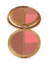 Makeup palette with four color swatches on a white background