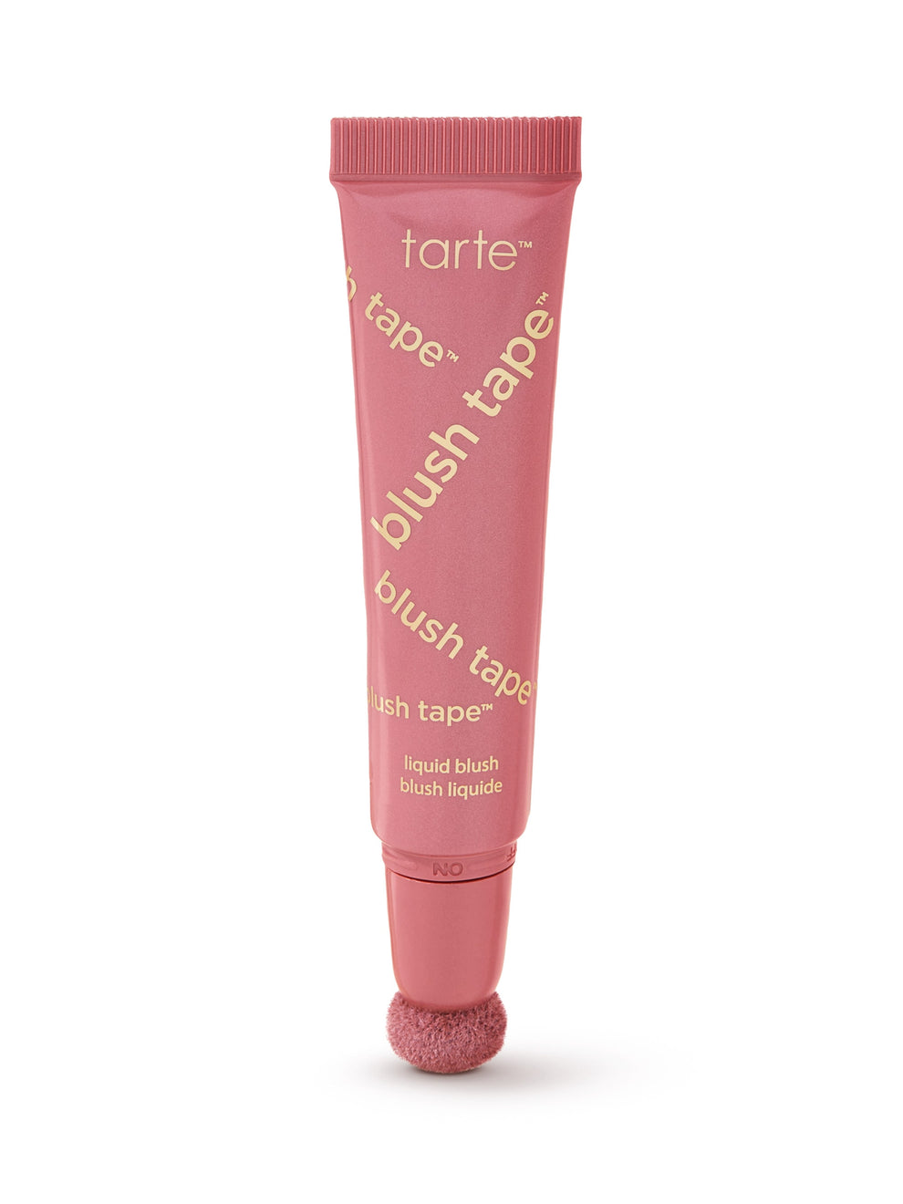 Pink tube of tarte blush tape on a white background