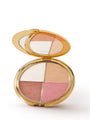 Makeup compact with four color shades on a white background
