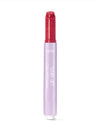 Tarte lip product with red cap and purple body on a white background