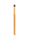 Makeup brush with a wooden handle on a white background