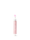 Pink skincare mask tube on a white background