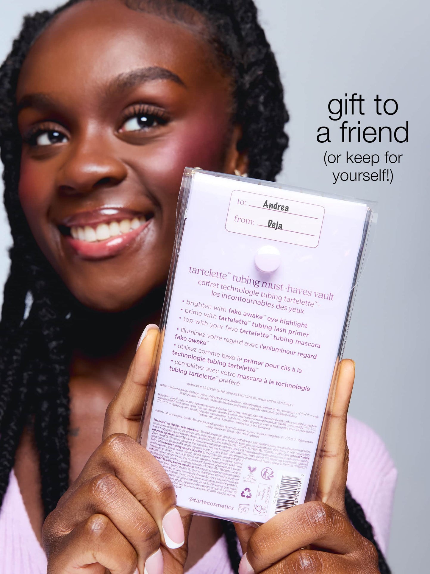 Woman holding a product packaging with text 'gift to a friend (or keep for yourself!)'