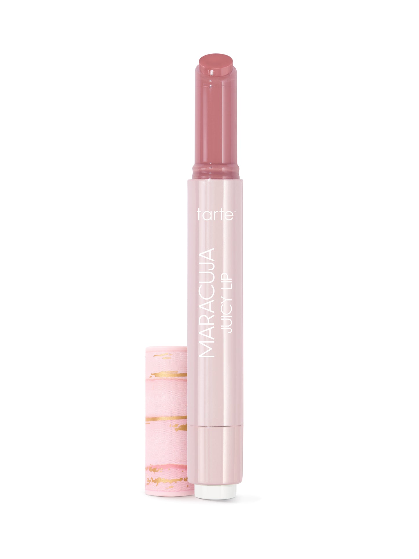 A pink lipstick with a textured surface stands upright, its cap placed beside it. The background is plain white, highlighting the sleek, pastel packaging.