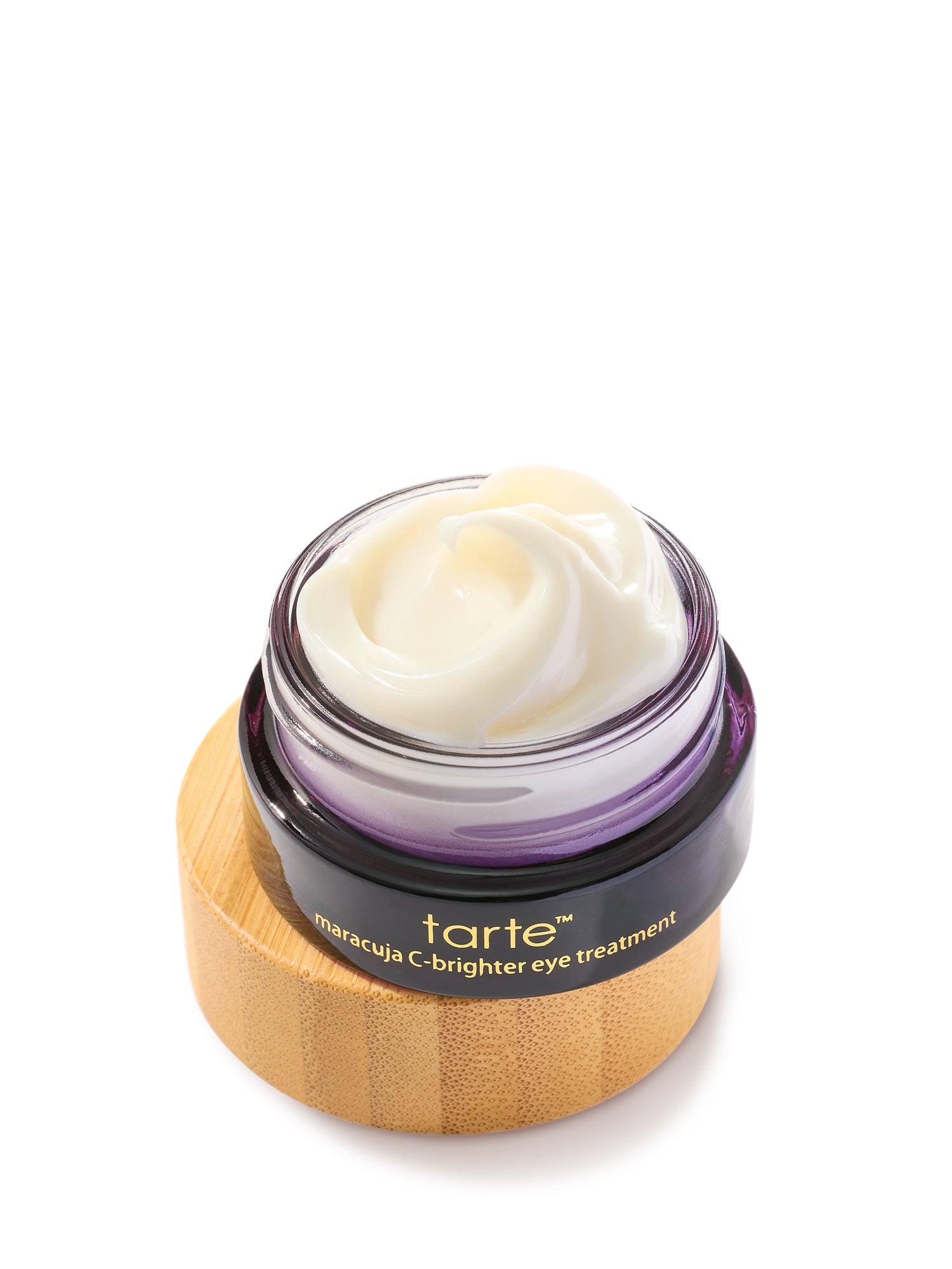 Tarte eye treatment jar with wooden applicator on a white background