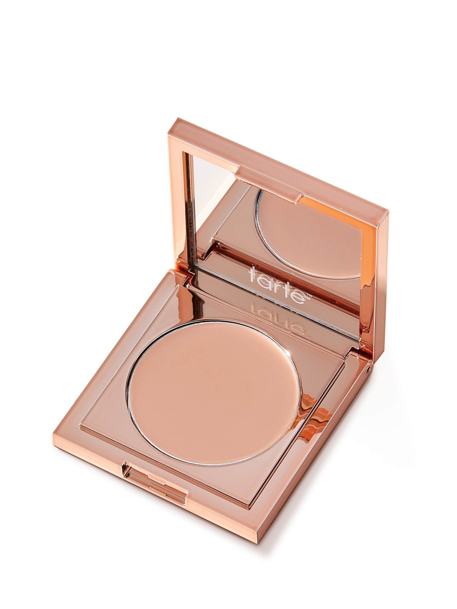 Compact powder in a rose gold case with 'tarte' branding on a white background