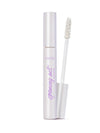 Mascara with white casing and brush on a white background