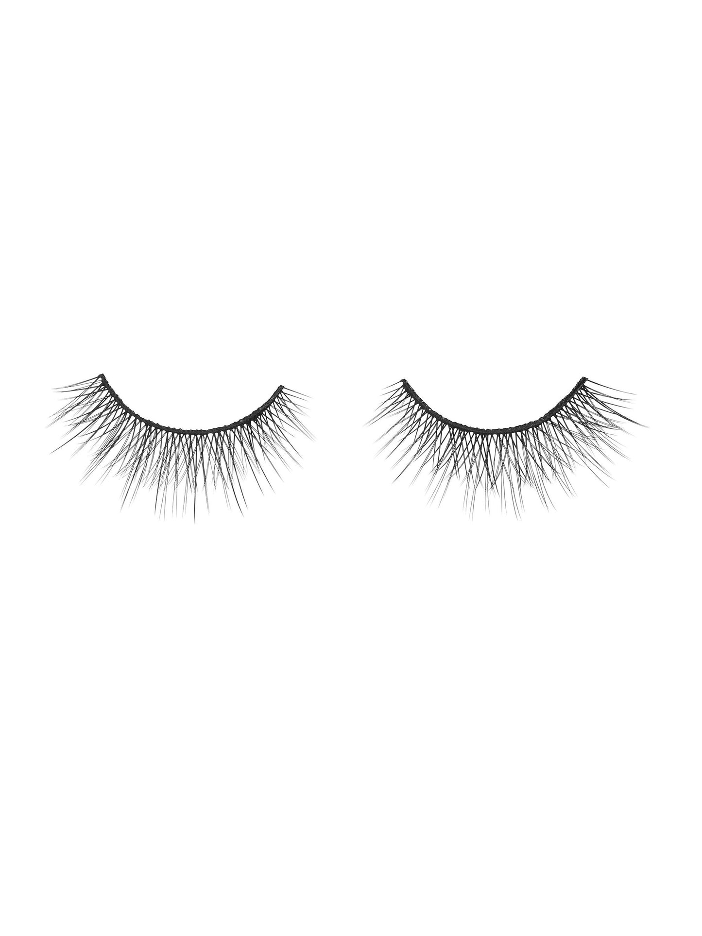 Pair of false eyelashes on a white background