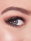 Close-up of a person's eye with smoky eye makeup